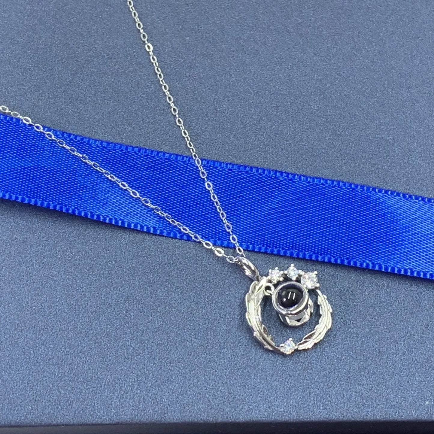 Zhejiang S925 Photo Projection Necklace Feather Zirconia